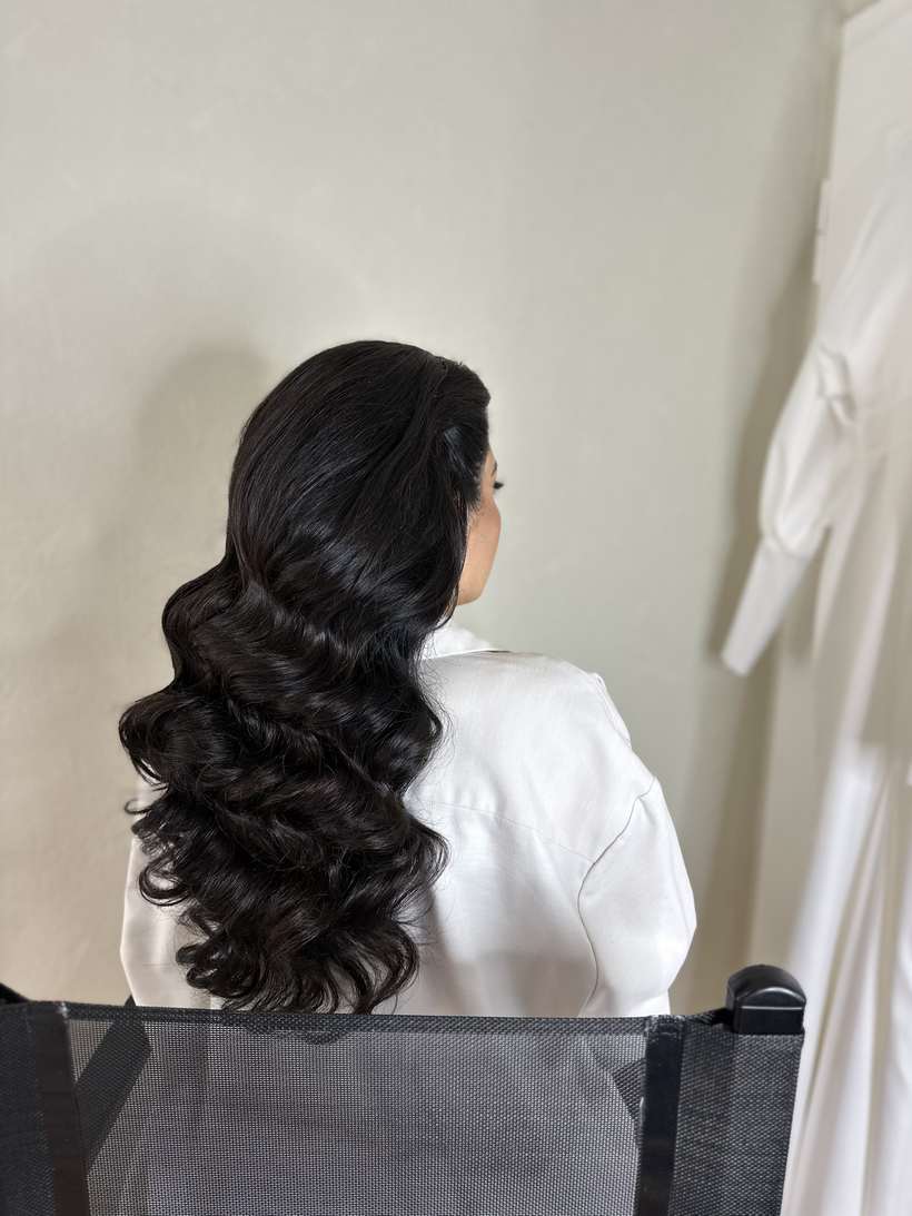 High Ponytail mit Wellen